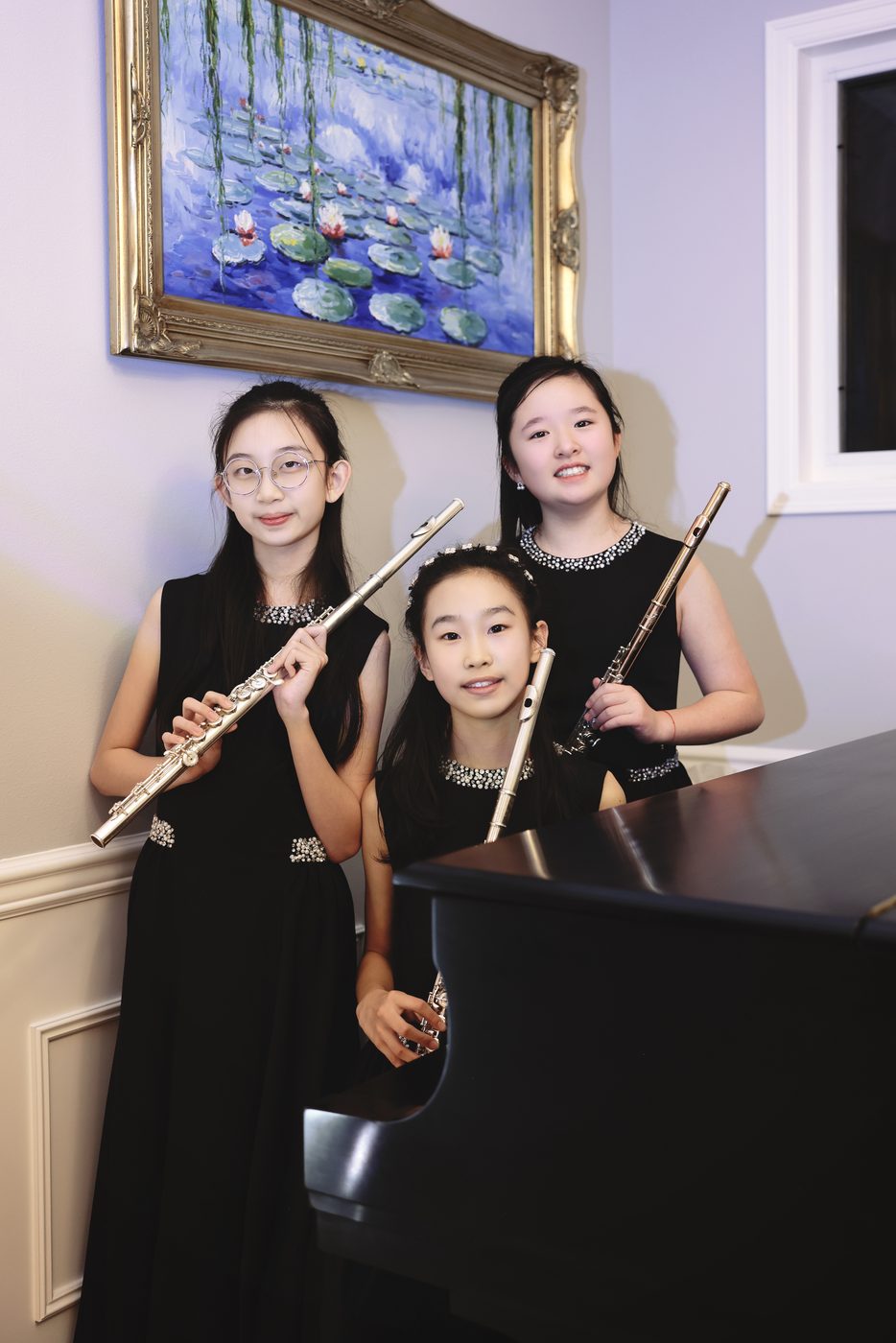 Shanni Li with two fellow flutists in a flute trio
