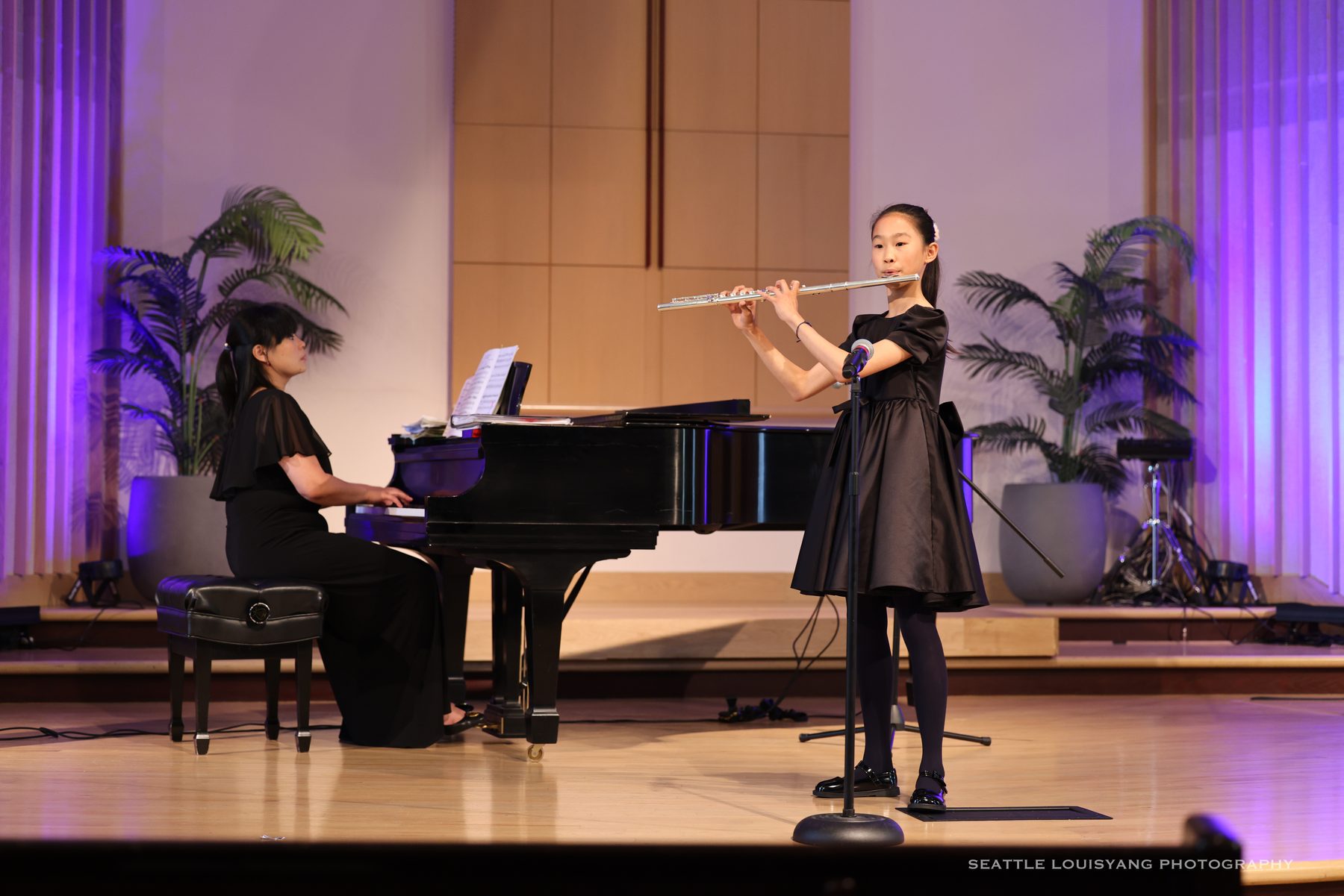 Shanni Li performing flute with a piano accompanist